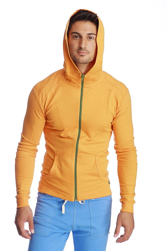 Form-fit crossover yoga track performance hoodie in vibrant yellow with green zipper and white drawstrings for active wear