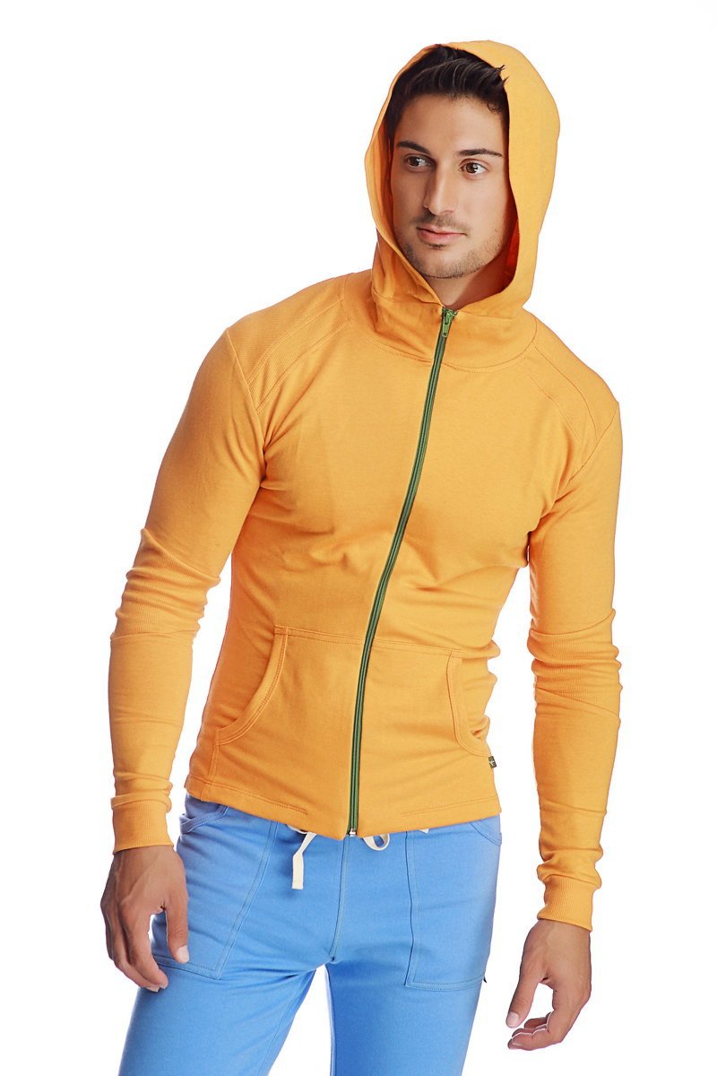 Form-fit crossover yoga track performance hoodie in vibrant sun orange yellow with green zipper trim and matching hood
