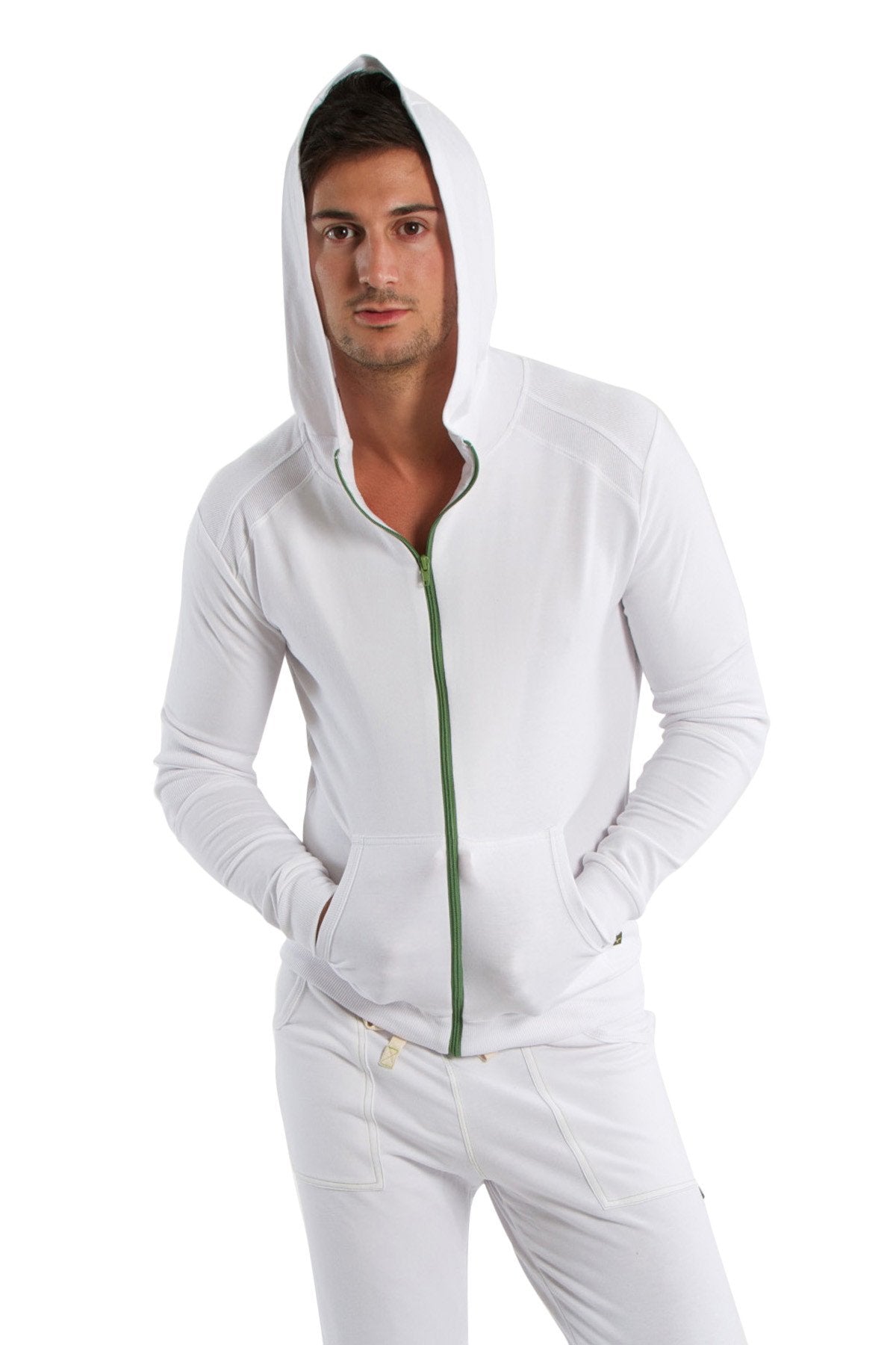 White form-fit crossover yoga track performance hoodie with green zipper and matching drawstring front view
