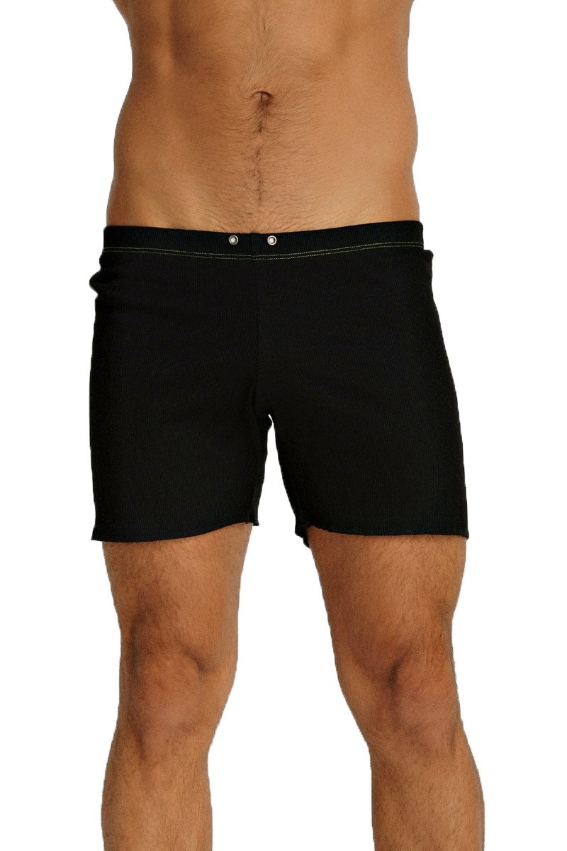 Black fusion yoga shorts with sleek minimalist design and subtle white stitching along the waistband