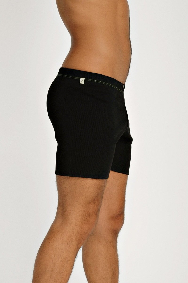 Black fusion yoga short briefs with subtle white logo on waistband ideal for activewear and comfort