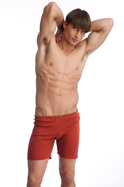 Fusion yoga short in cinnabar red featuring a snug fit elastic waistband designed for athletic use