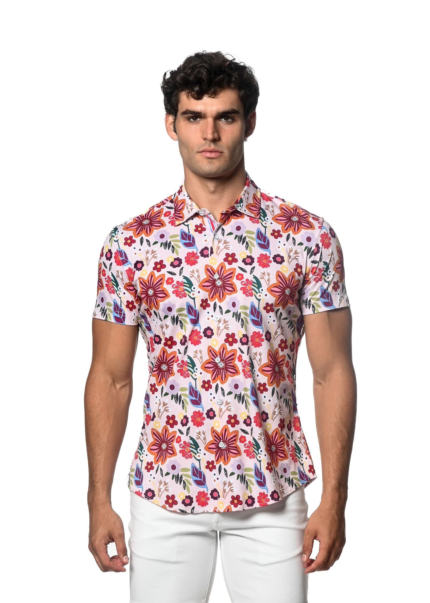 A vibrant garden print stretch knit shirt in white with bold red orange and purple floral patterns and short sleeves