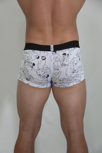 White boxer briefs with black line drawings of figures and a solid black waistband from gay karmasutra trunk collection