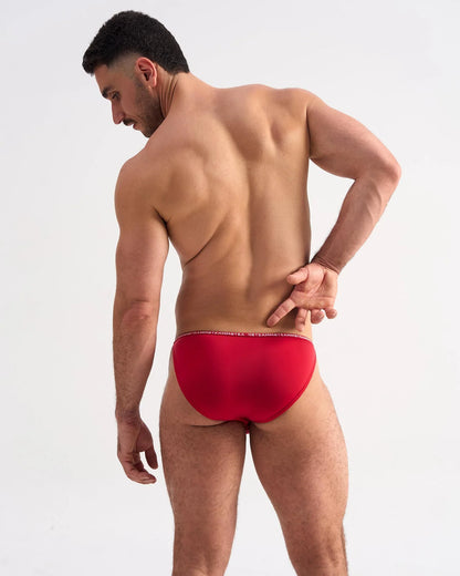 Red glide micro brief with subtle elastic waistband in soft breathable fabric for comfortable daily wear