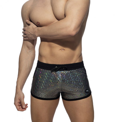 Glitter short swim trunks with black trim and shimmering iridescent silver holographic fabric for beachwear