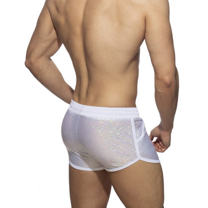 White translucent mesh shorts with subtle iridescent glitter pattern and white elastic waistband titled glitter short