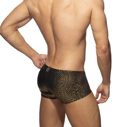 Black swim trunks with shimmering gold dot pattern from gold stones trunk collection for stylish beachwear