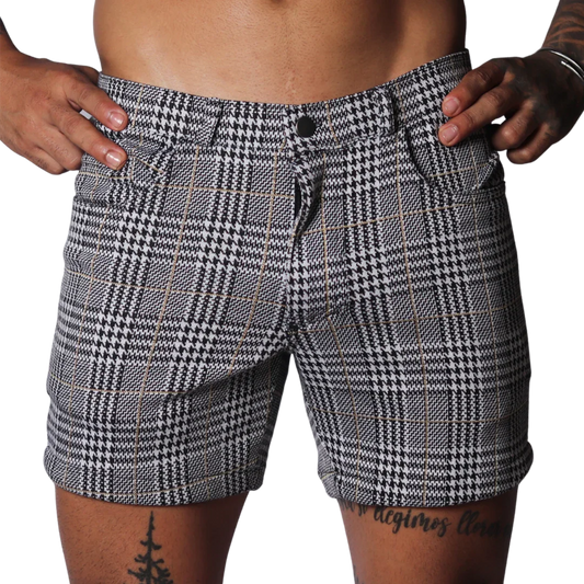 Black and white houndstooth print shorts with a subtle gold windowpane check, featuring a classic five-pocket design.