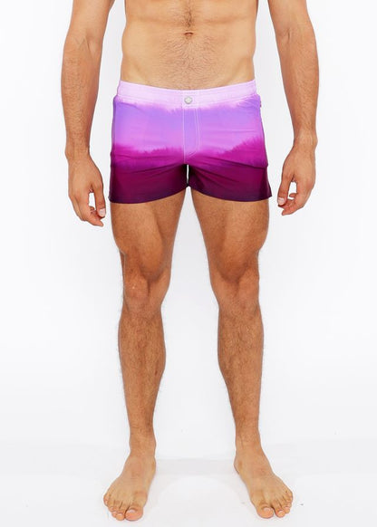 Gradient printed swim short featuring a purple gradient swim trunk with fading transition from lavender to deep violet
