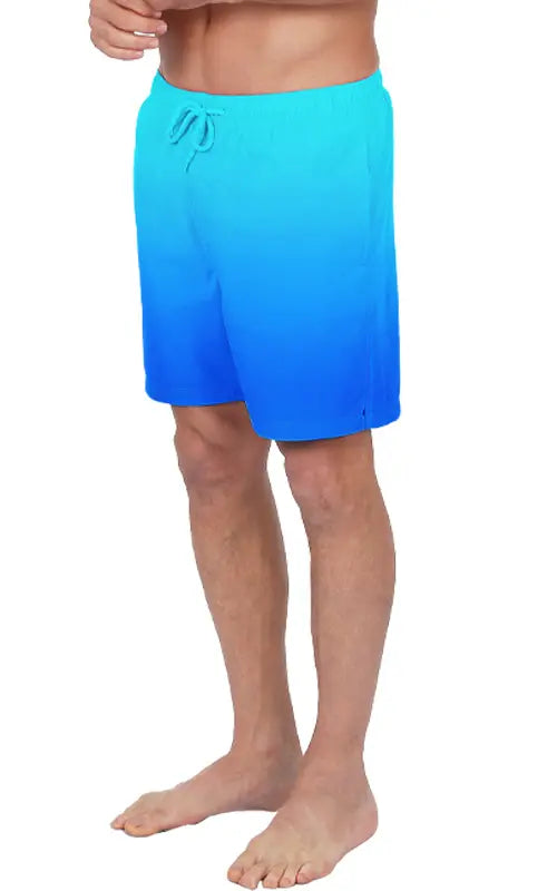 Blue gradient swim short with a drawstring waistband designed for comfortable beach and pool use