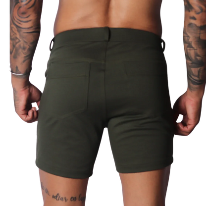 Form-fitting Sunday green short in a smooth, matte fabric with two back pockets and a clean, minimalist design.