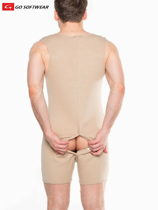 Men's open back onesie in pebble tan made of soft material featuring a snap closure and sleeveless design shown from the back by Go Softwear