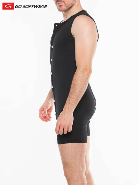 Black open back onesie for men by Go Softwear featuring sleeveless design and snap button closure shown on a model from the side