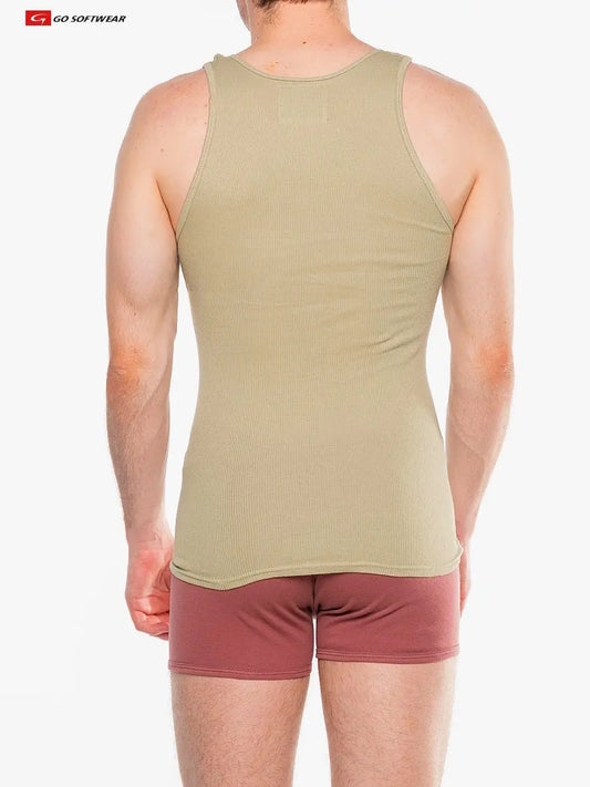 A model wearing a sage leaf ribbed tank top from Go Softwear showing the back view with a fitted design