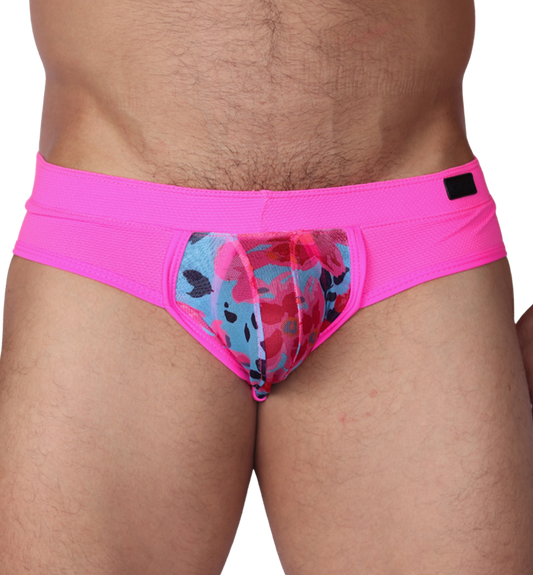 Front view of Gigo Garden fuchsia brief, featuring textured fuchsia fabric and a floral mesh pouch for men.