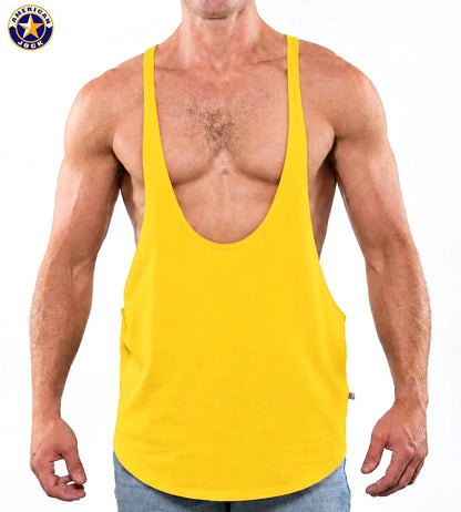 Yellow bodybuilding string tank top with a deep scoop neckline worn by a model featuring a relaxed fit by AMERICAN JOCK