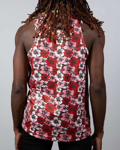 A vibrant red pink and white floral patterned hawaiian hibiscus print tank top with a black background