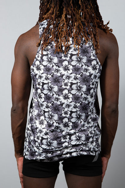 Hawaiian hibiscus print tank top with black and white floral design and fitted sleeveless style