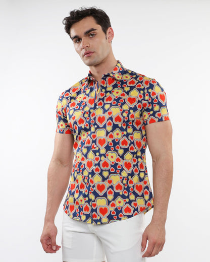 A vibrant hearts print stretch knit short sleeve button up shirt in red yellow and navy blue for men