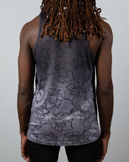 Gray hibiscus ombre print tank top with black outlined hibiscus flower pattern in a lightweight fabric