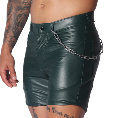 Dark green faux leather fitted shorts with a silver chain accessory attached to the waistband.