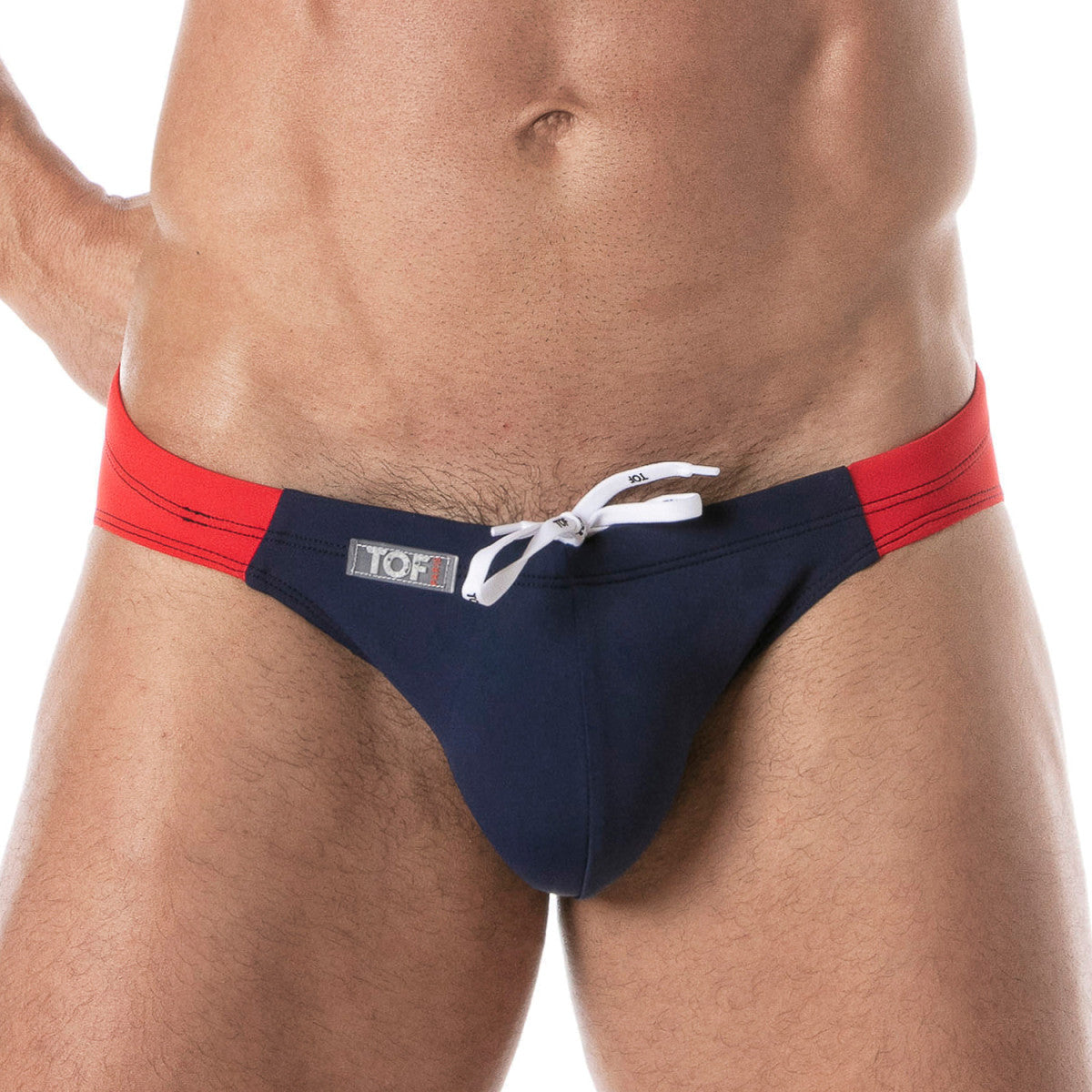 Navy blue and red men’s holidays swim bikini trunks with white drawstring tie perfect for beachwear