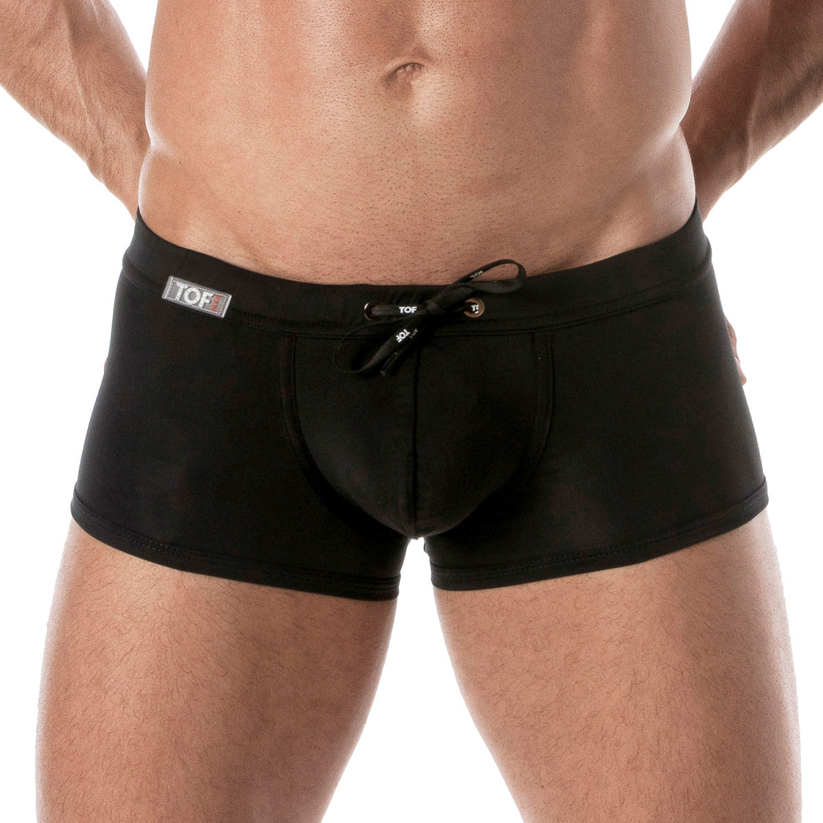 Black holidays swim trunk with drawstring waistband and subtle branding perfect for beach and pool use