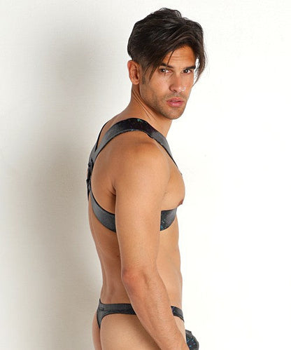 Black leather hologram harness lingerie with adjustable straps and a snug fit shown from the back side