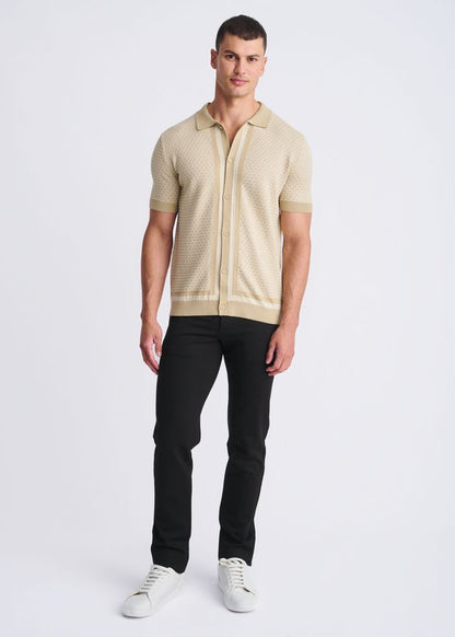 Beige honeycomb textured knit polo shirt with button front and short sleeves made from soft knit material