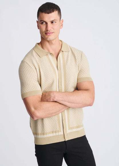 Beige honeycomb textured knit polo shirt with subtle vertical stripes and ribbed cuffs for casual wear
