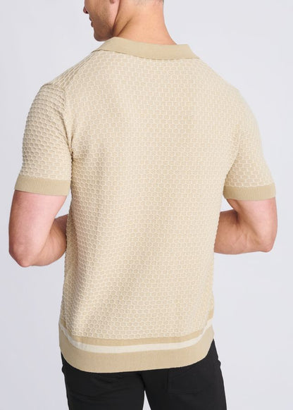 Beige short-sleeved polo shirt with textured honeycomb knit and ribbed collar cuffs and hem in knit fabric