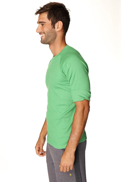 A vibrant bamboo green hybrid crew neck raglan tee made of soft fabric with short sleeves