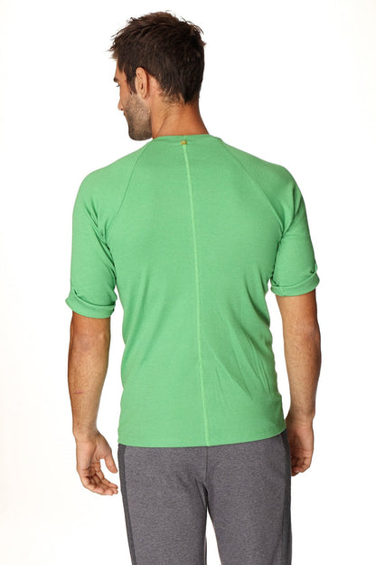 A vibrant green hybrid crew neck raglan tee with short sleeves ribbed texture and rolled cuffs made from bamboo fiber
