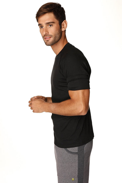 Hybrid crew neck raglan tee in black featuring a short-sleeved athletic design with subtle ribbed texture