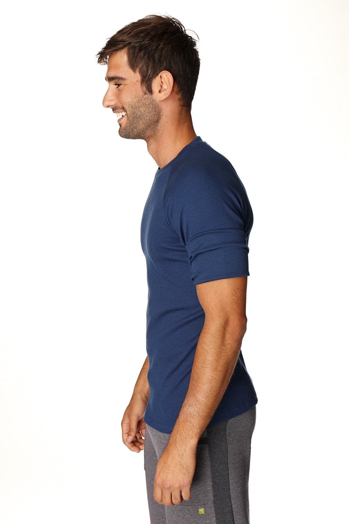 Navy blue short-sleeved hybrid crew neck raglan tee made from breathable athletic fabric for active wear