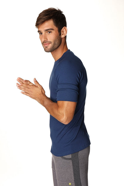 A navy blue hybrid crew neck raglan tee with short sleeves and subtle ribbed texture for athletic wear
