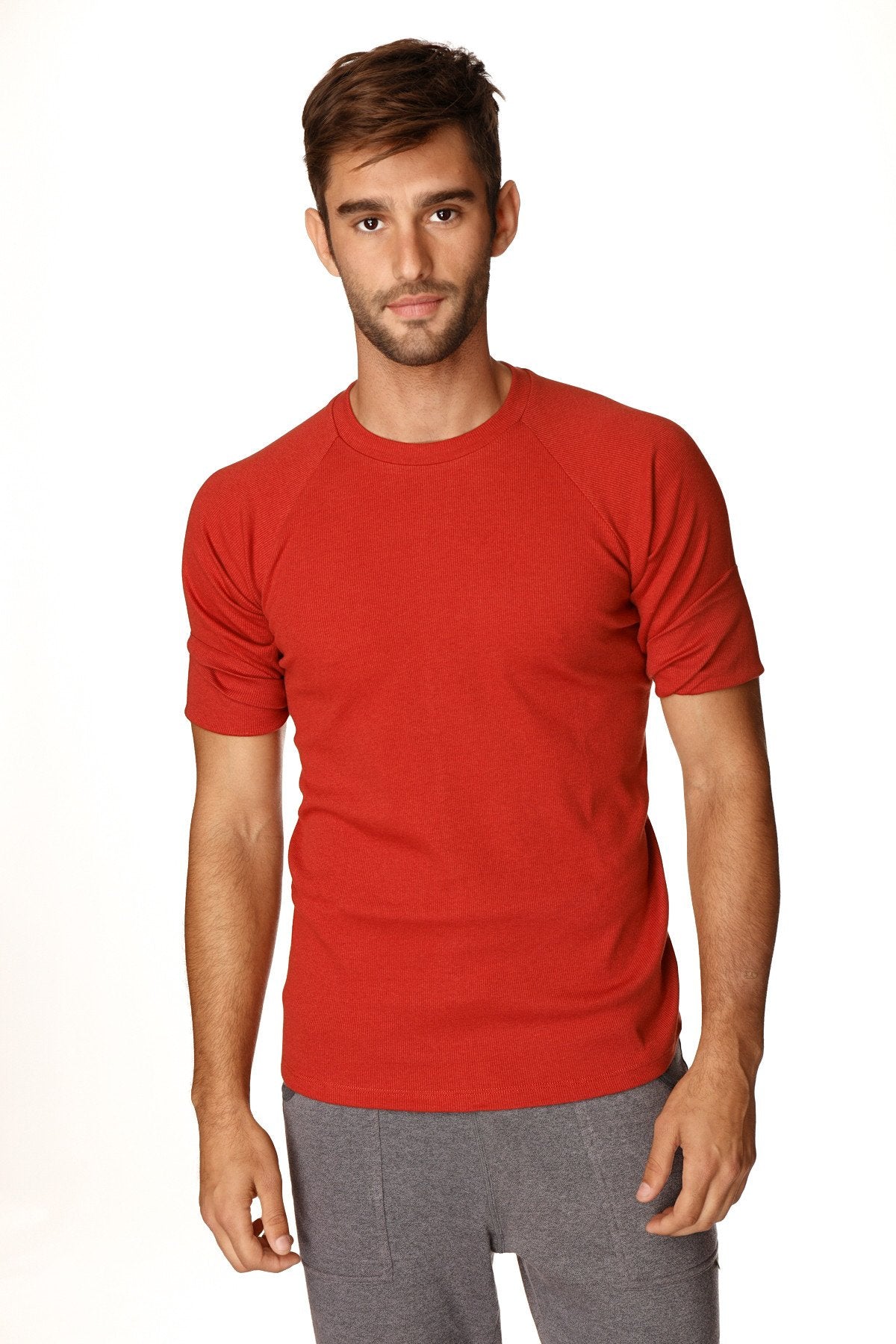 Red short-sleeved hybrid crew neck raglan tee in cinnabar red made from soft breathable fabric