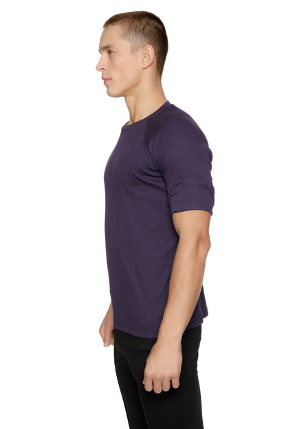 A dark purple hybrid crew neck raglan tee made of soft cotton with short sleeves and a comfortable fit