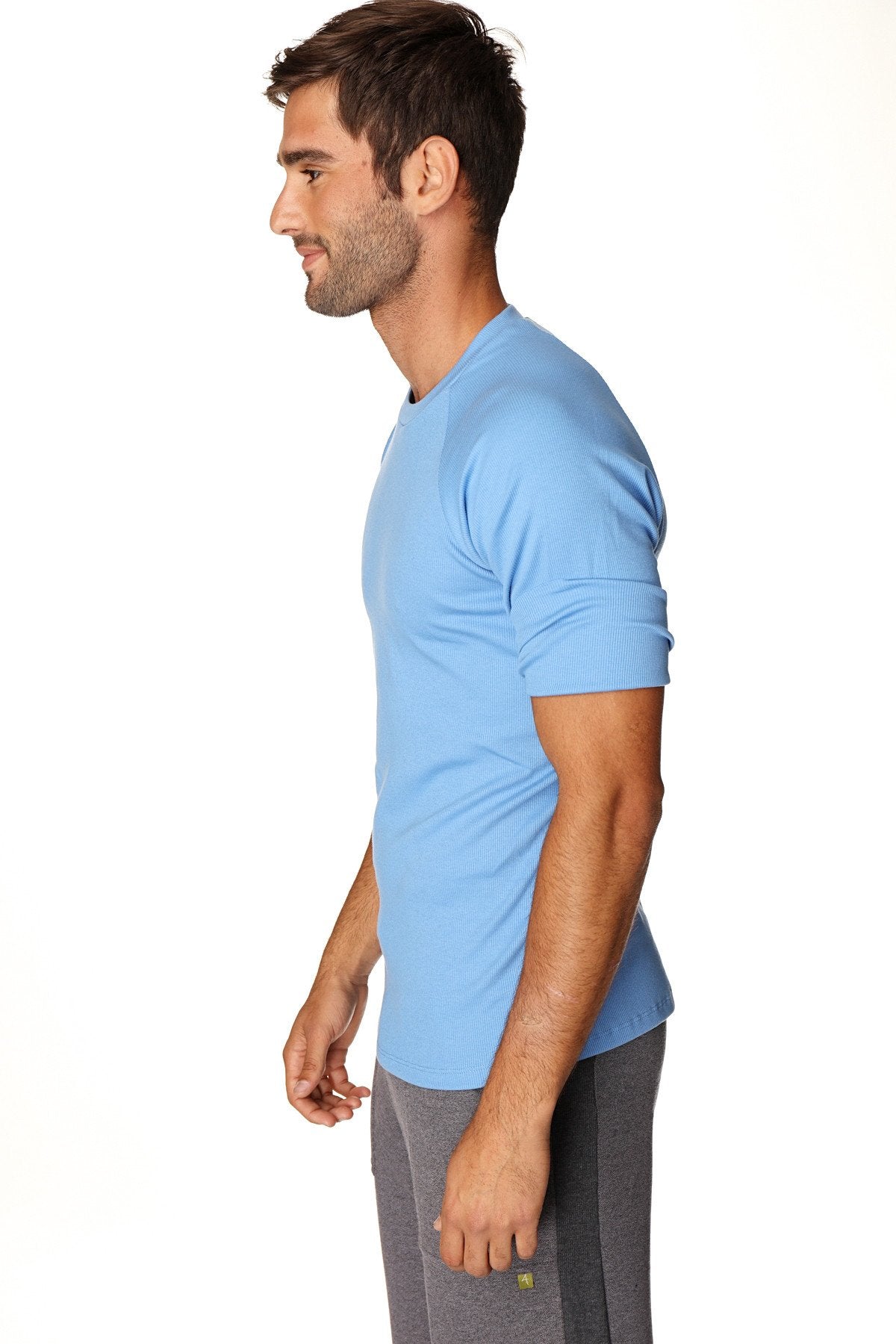 Light blue hybrid crew neck raglan tee with short sleeves and subtle ribbed cuffs for athletic wear