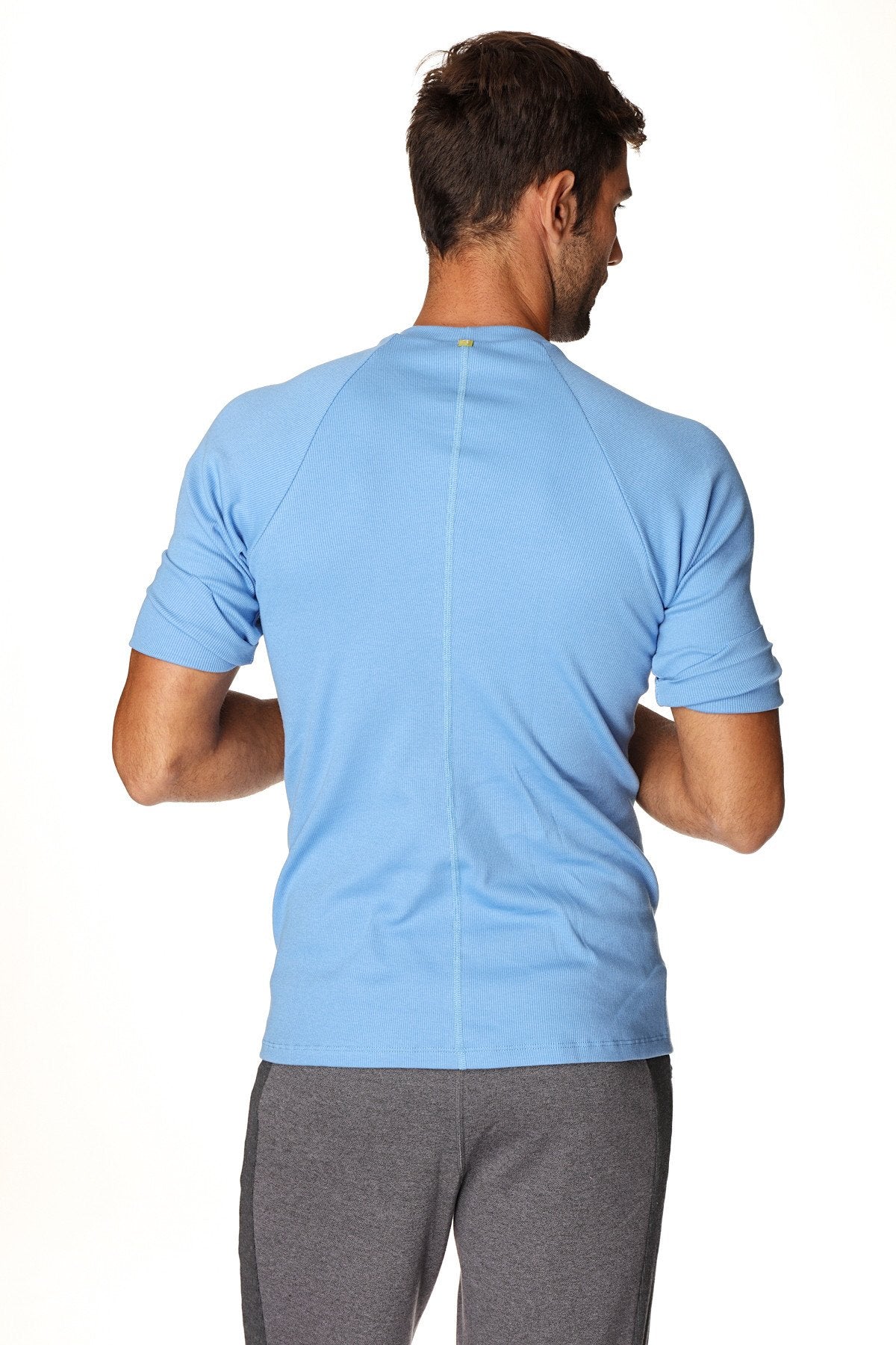 Light blue hybrid crew neck raglan tee with short sleeves and a subtle vertical seam on the back