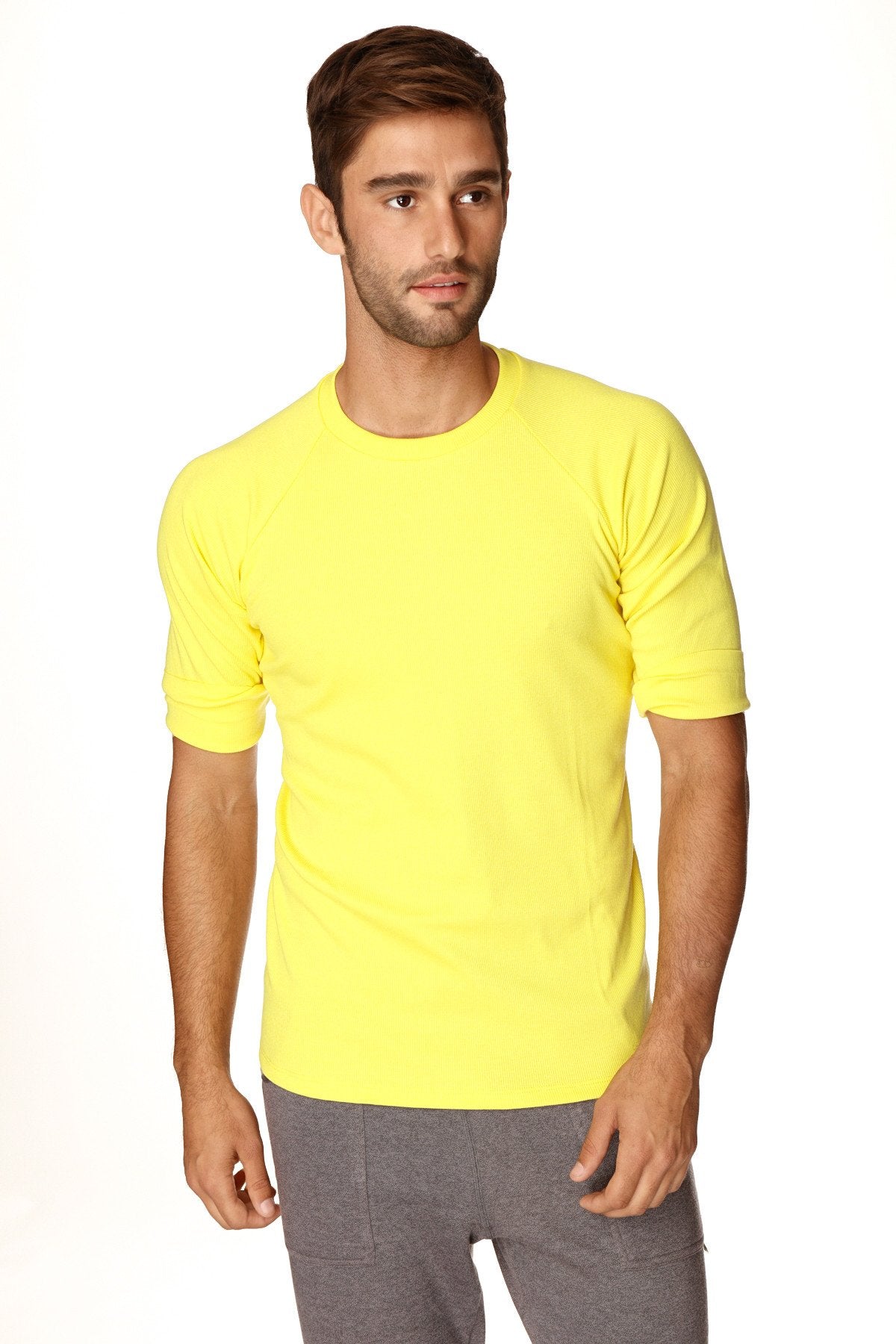 Bright yellow hybrid crew neck raglan tee with short sleeves made from soft breathable fabric for casual wear