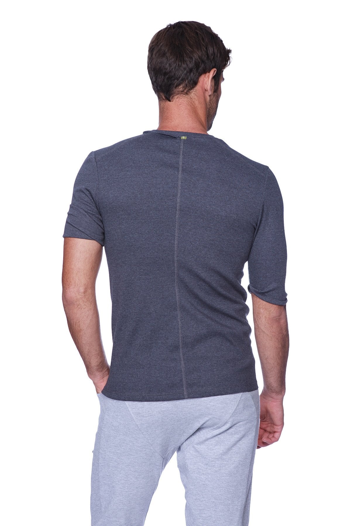 Dark gray textured short-sleeve hybrid v-neck t-shirt with subtle vertical seam on the back in charcoal color