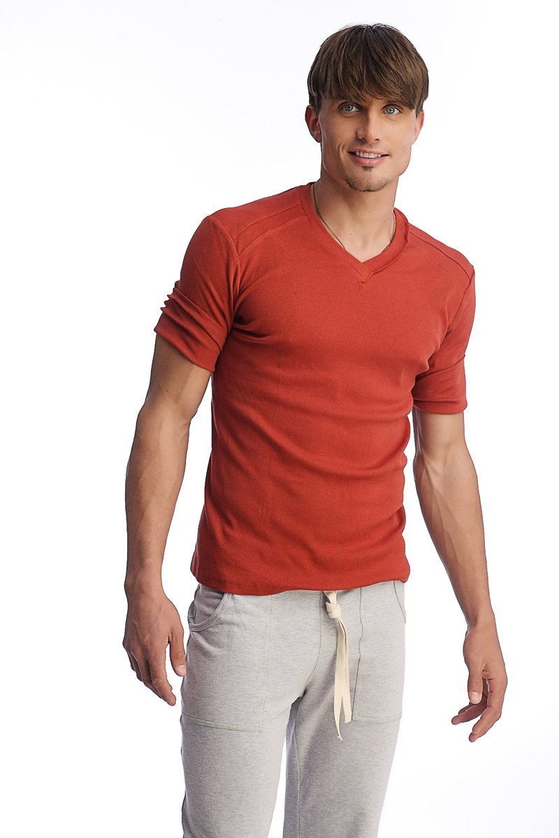 Men’s cinnabar red hybrid v-neck short-sleeve t-shirt with textured fabric and rolled-up sleeves