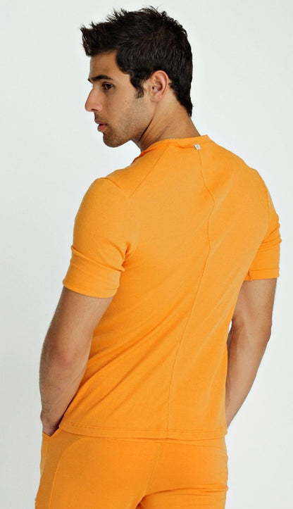 Bright orange hybrid v-neck short-sleeved athletic top with sleek form-fitting design for active wear