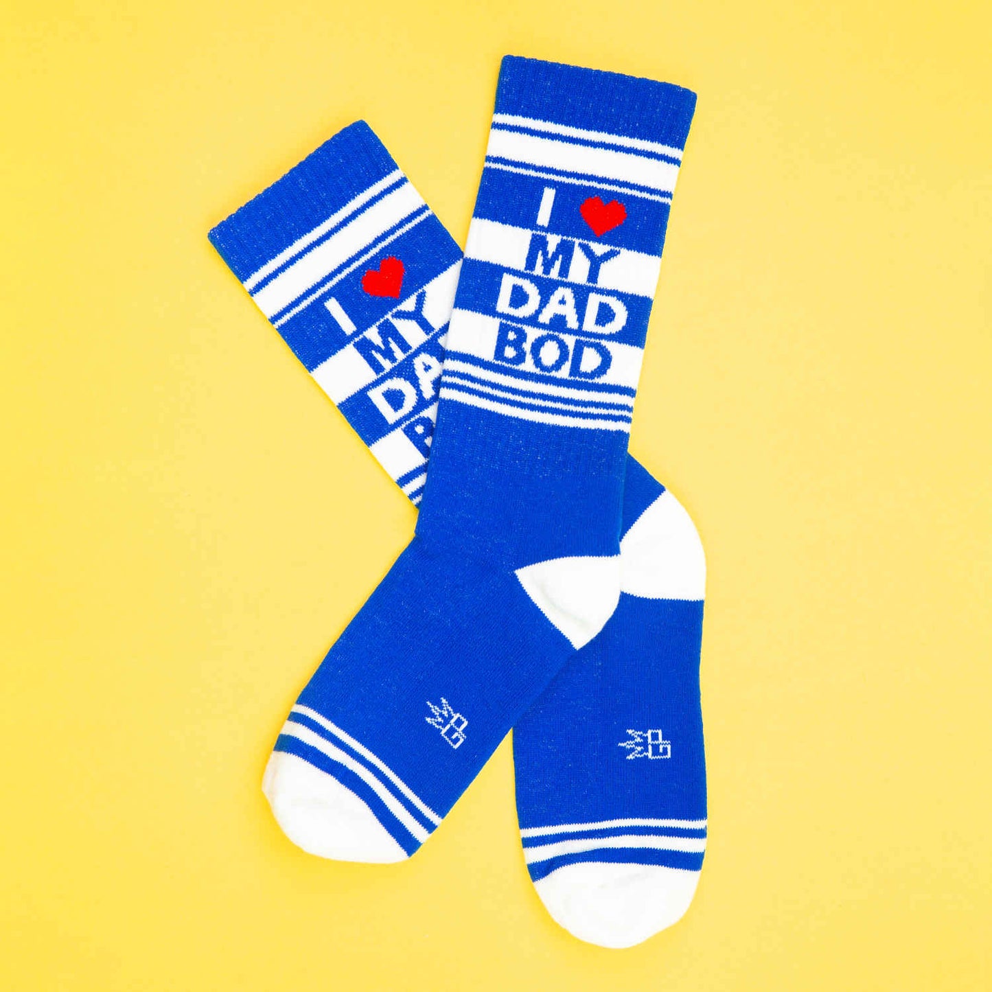 Blue crew socks with white stripes and i heart my dad bod text featuring a red heart symbol design