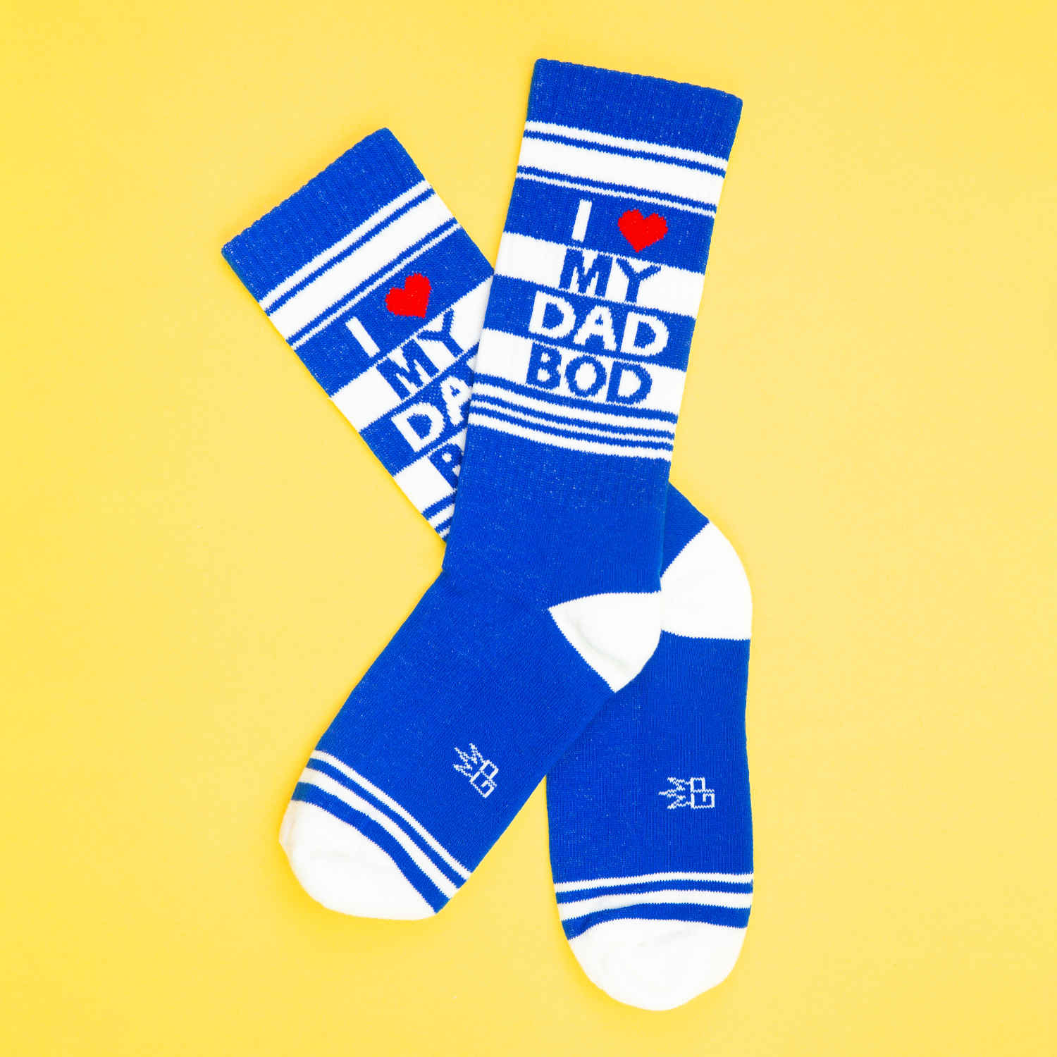 Blue crew socks with white stripes and i heart my dad bod text featuring a red heart symbol design