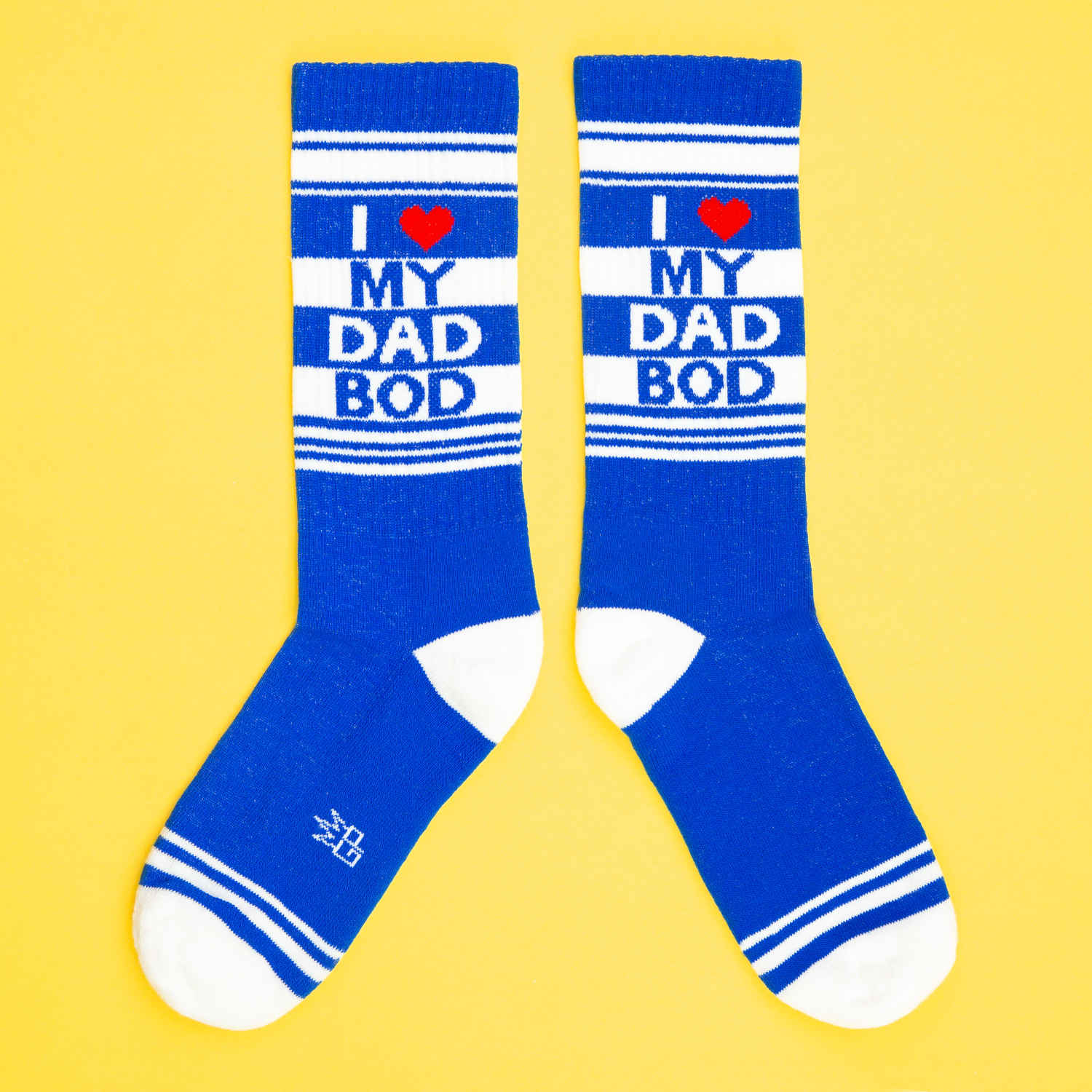 Blue and white striped crew socks with i heart my dad bod in bold blue letters and a red heart symbol across top