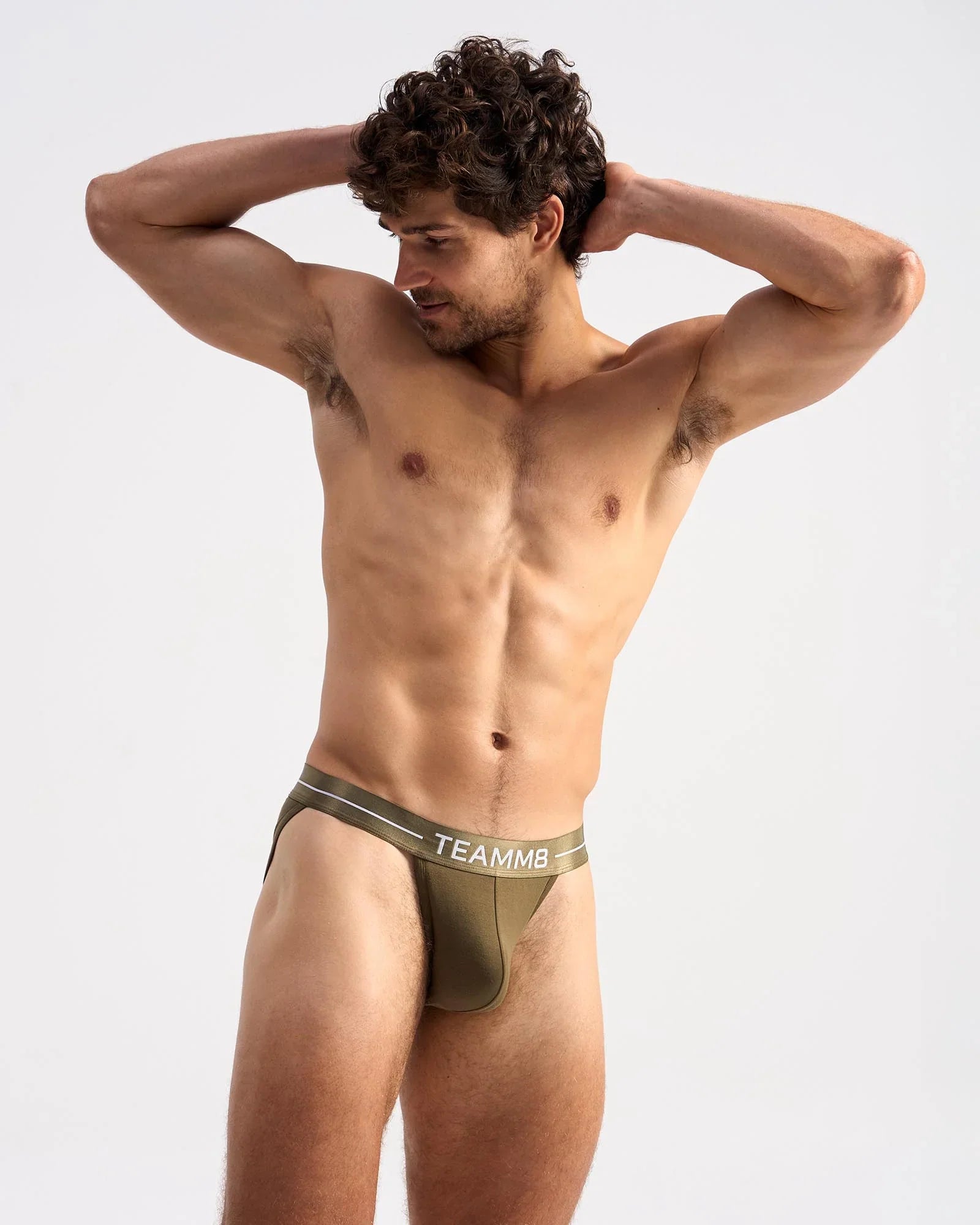 Olive green icon sports brief with white logo waistband and subtle side stripes designed for active wear