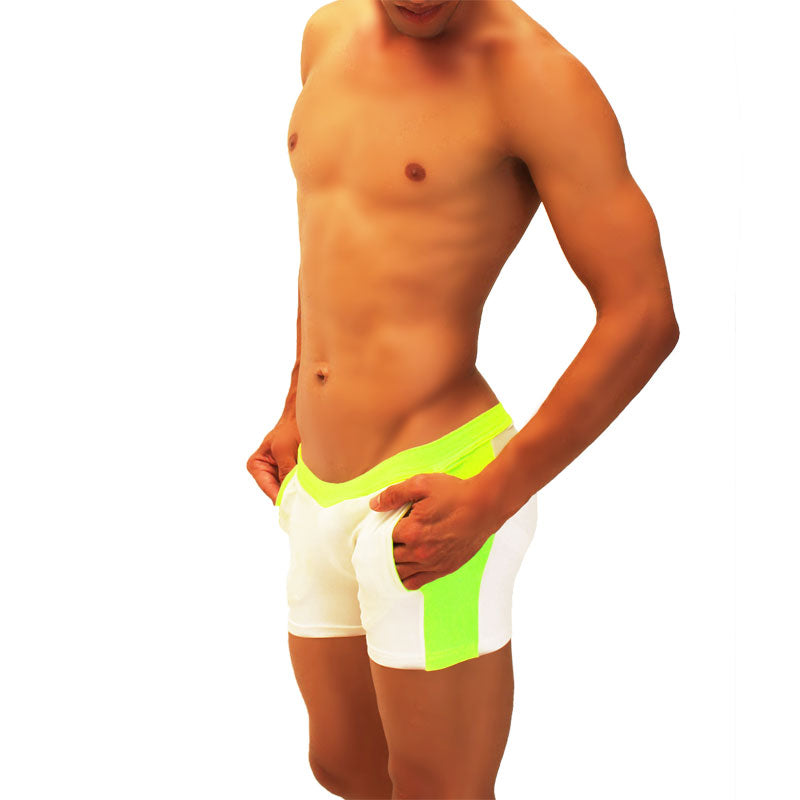 Icker Sea contrast side panel jock shorts in white and neon green with a bold color-block design for athletic use